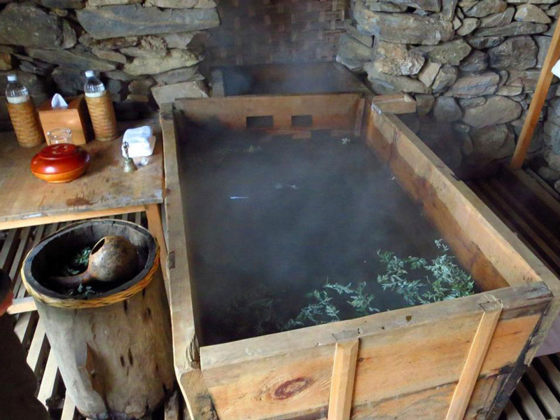 A traditional hot stone bath set ready for the traveler